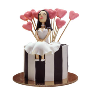 Doll Setting on Top of Cake