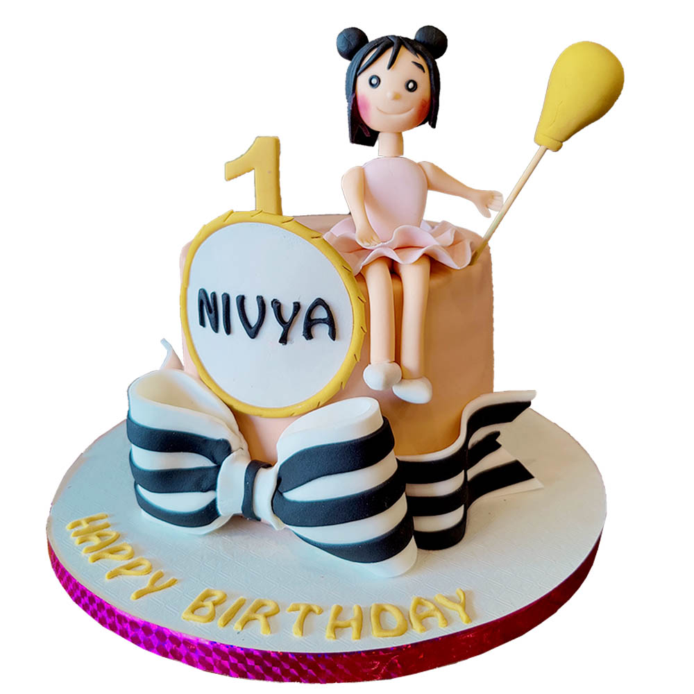 Doll Seating on Cake